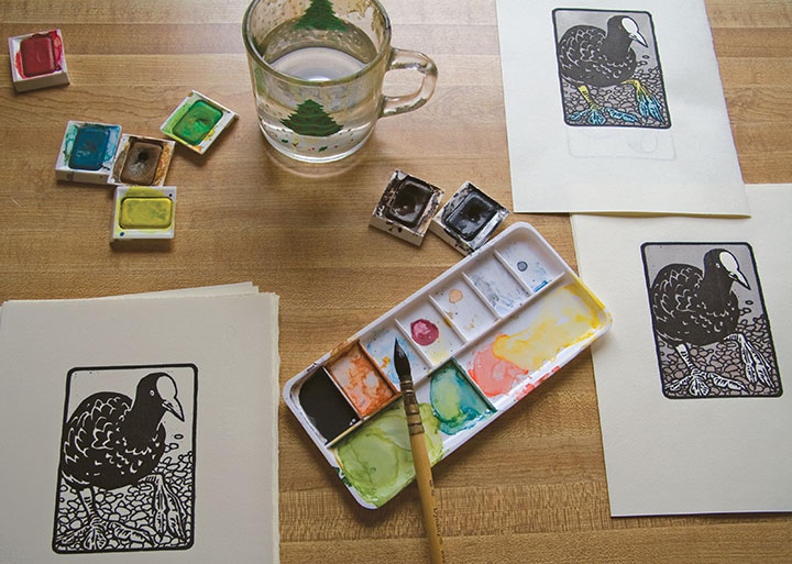 Process photo of "Flock" hand-painted linocut bird prints by Chandler O'Leary
