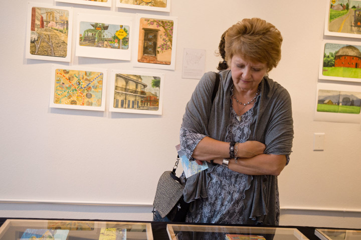 "Jaunt + Jot" exhibition featuring sketchbook drawings by Chandler O'Leary. Photo by Shawn H. Nichols, taken at the Artist Trust on Tour: Tacoma event.