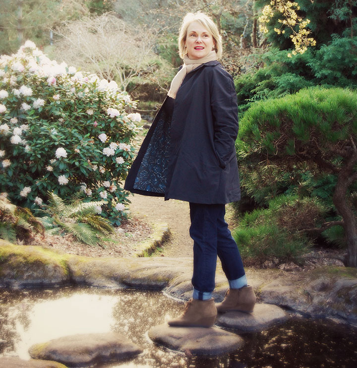 Sonja Silver wearing her original raincoat, featuring lining pattern illustrated by Chandler O'Leary. Photo by Summer Hess Briggs.